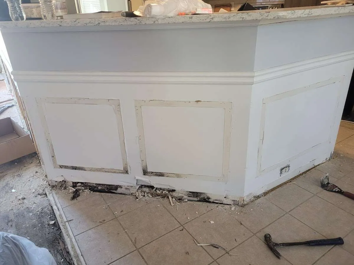 Water damage and mold on kitchen during Storm Damage Restoration in Walker
